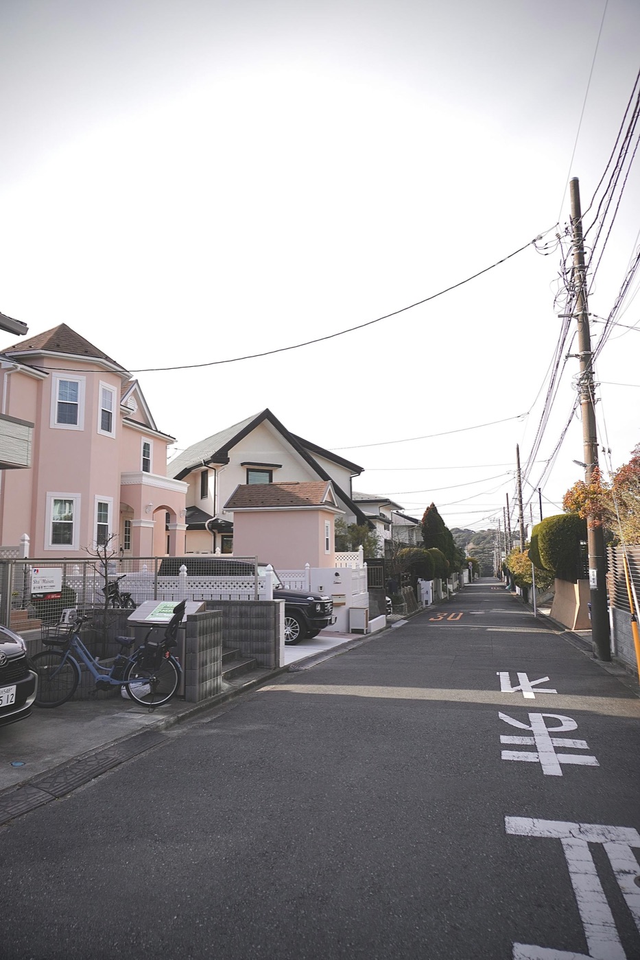 Quiet Japanese residential street in daylight